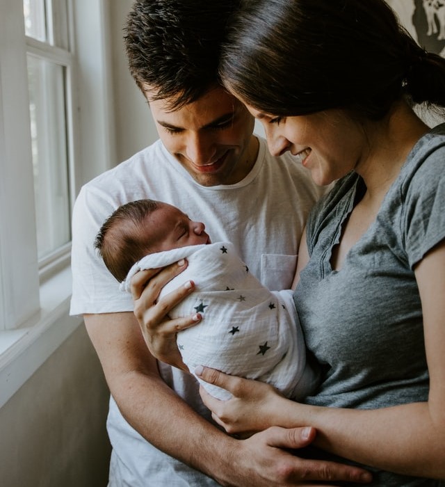 a photo of happy new parents